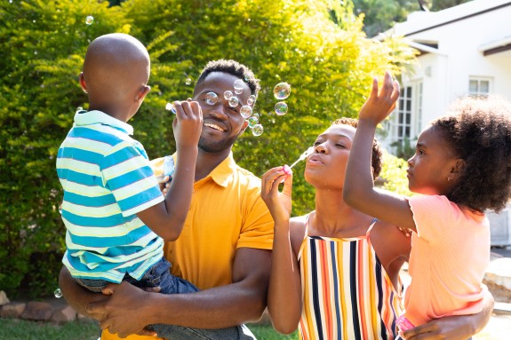 African American family spending time together in their garden